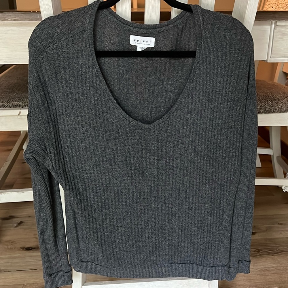 Grey long sleeved v-neck shirt